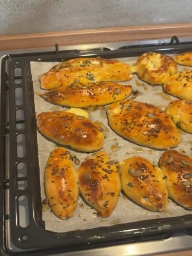 Seeded bread rolls baked in Catania kitchen oven