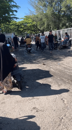 Banda Aceh outdoor fish market buzzing on a clear day