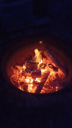 Quiet Evening Moments Documented Around Backyard Fire in Viadana