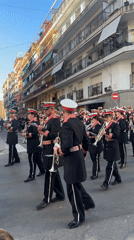Religious procession with ornate floats parades through Alicante streets