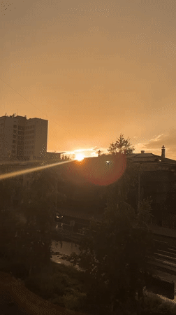 Rainbows and dusk light over Krasnoyarsk after rain