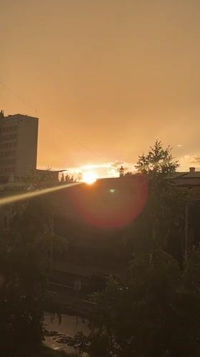 Rainbows and dusk light over Krasnoyarsk after rain