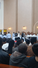 Wedding ceremony captured at church altar during ring exchange