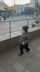 Toddler spotted walking on Simferopol sidewalk