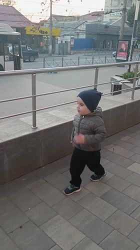 Toddler spotted walking on Simferopol sidewalk