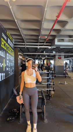 Woman exercises at Bat Yam gym during morning workout session