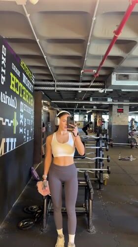 Woman exercises at Bat Yam gym during morning workout session