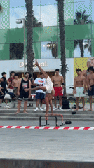 Calisthenics and city life along Barcelona's sunny waterfront