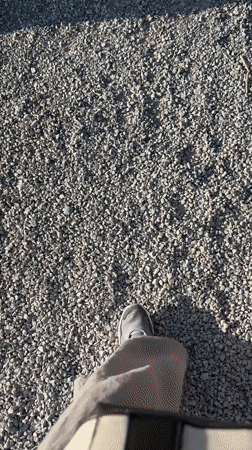 Tourist documents scenic walk through Sveti Stefan coastal resort