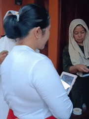 Traditional costume parade prep underway in a Tasikmalaya neighborhood