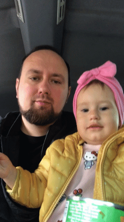 Father and child photographed in vehicle, Bielsko-Biała