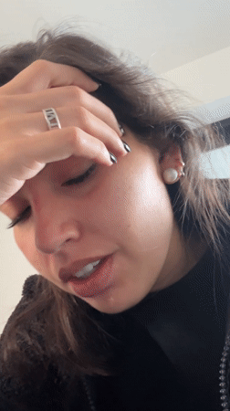 Woman records speaking videos in Mexican home