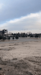 Overcast skies captured above barren terrain in Tehran