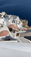 Wandering Oia's clifftop lanes, shops, and sea views