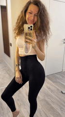 Woman takes mirror selfies in residential space