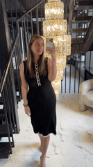 Woman takes selfies in upscale Shcherbinka interior