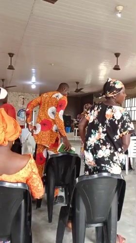 Church gathering in Lokoja with music, speaking, and community