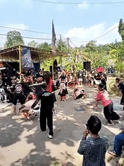 Traditional costumed performance draws crowds in Kerjo, Indonesia