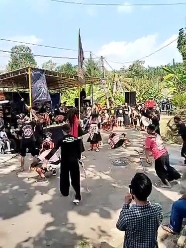 Traditional costumed performance draws crowds in Kerjo, Indonesia