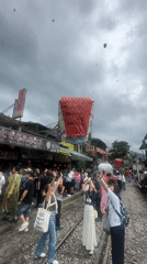 Sky lantern festival draws crowds to New Taipei railway street