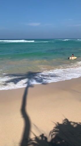 Early morning surfing activity captured at Ahangama Beach, Sri Lanka