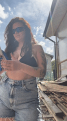 Woman prepares for work at Russian construction site
