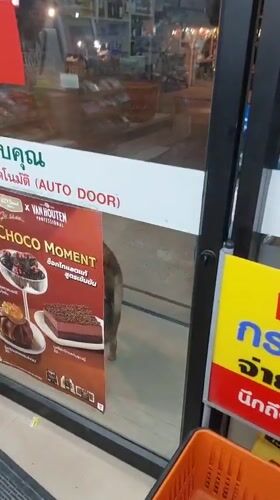Convenience store entrance with Choco Moment promo, Baan Mae Nam