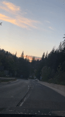 Driver captures sunset view approaching intersection in Progled, Bulgaria