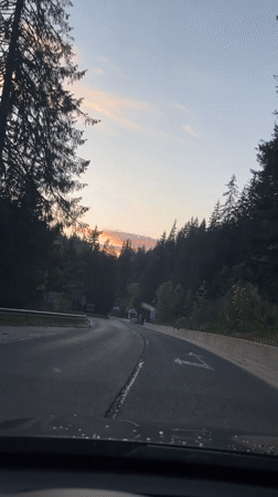 Driver captures sunset view approaching intersection in Progled, Bulgaria