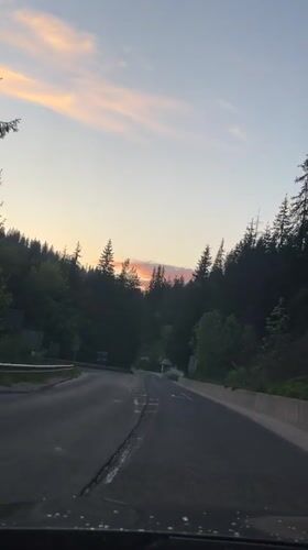 Driver captures sunset view approaching intersection in Progled, Bulgaria