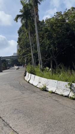 Daytime approach to Big Buddha statue documented in Karon