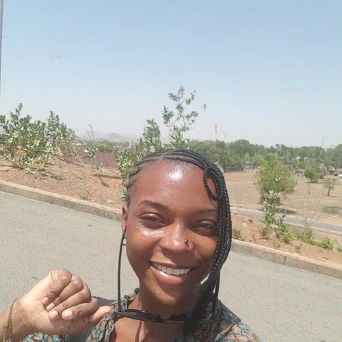 Woman documents street scenes and selfies in Bauchi, Nigeria