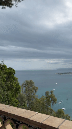 Tourists document scenic Taormina views and streets Sunday afternoon