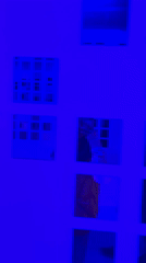 Grid-patterned wall filmed under blue lighting in Batumi