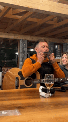 Acoustic guitar performance in Gusinje bar