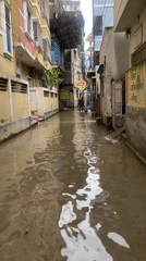 Knee-deep floodwater inundates Dhaka streets in early August