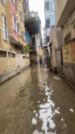 Knee-deep floodwater inundates Dhaka streets in early August