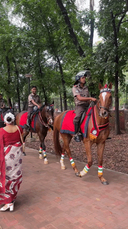 Mounted police patrol traditional procession in Dhaka park