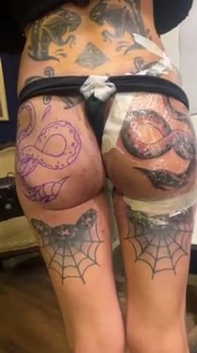 Tel Aviv tattoo studio session documents extensive body art