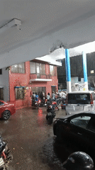 Heavy rain brings queues to Dhaka gas station