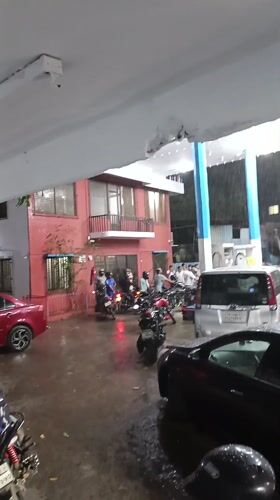 Heavy rain brings queues to Dhaka gas station