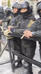 Police deploy barricades as crowds gather in La Paz