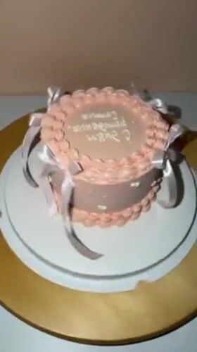 Pink decorated cake documented in Tel Aviv home setting
