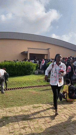 Large crowd gathers at Sasa Market building entrance