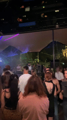Young adults gather for laser light show at Sofia nightclub