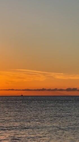 Sunset along Costa Adeje on the summer solstice