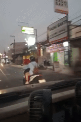 Evening ride through a commercial strip in Central Java