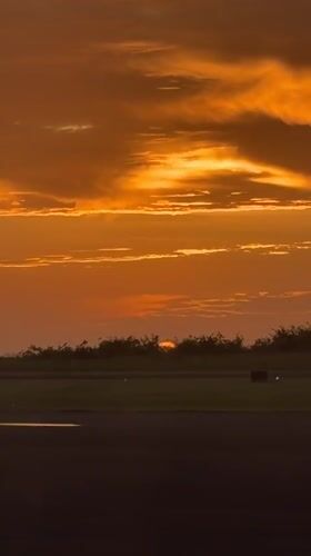 Travelers Document Dramatic Sunset at Ciudad Guayana Airport