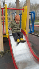 Toddler enjoys overcast morning playground visit and grocery shopping