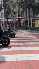 Motorcycle group rides through downtown Tbilisi streets